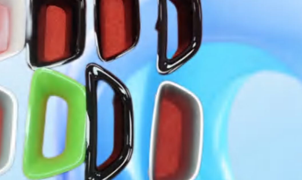 Two-colour painted trim parts